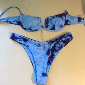 Woman’s blue tie dye bikini